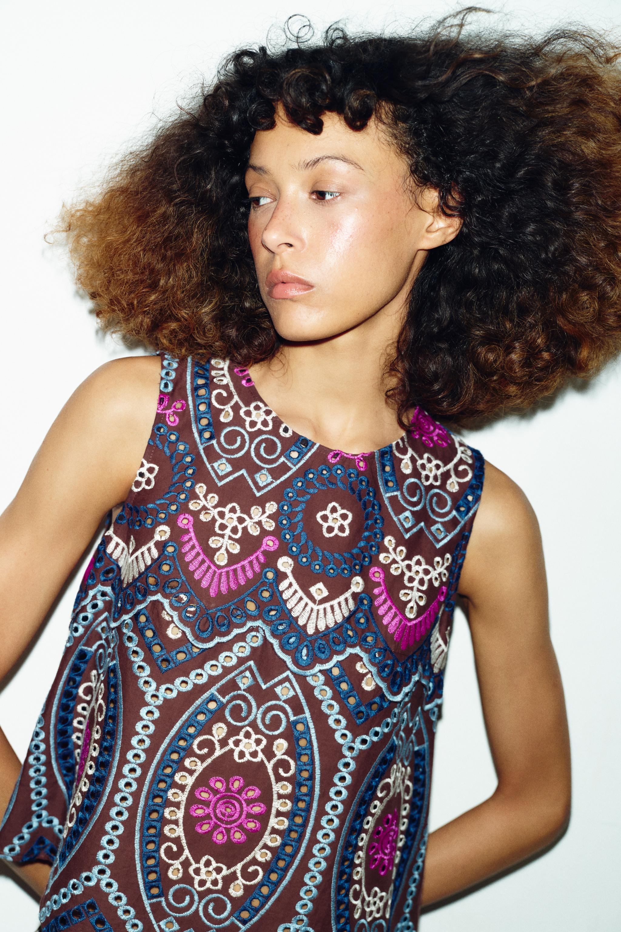 EMBROIDERED EYELET TOP